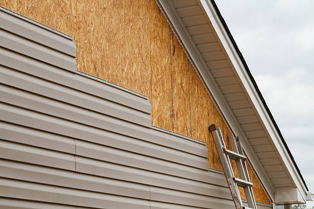 Professional Siding technician working in Upperco, MD